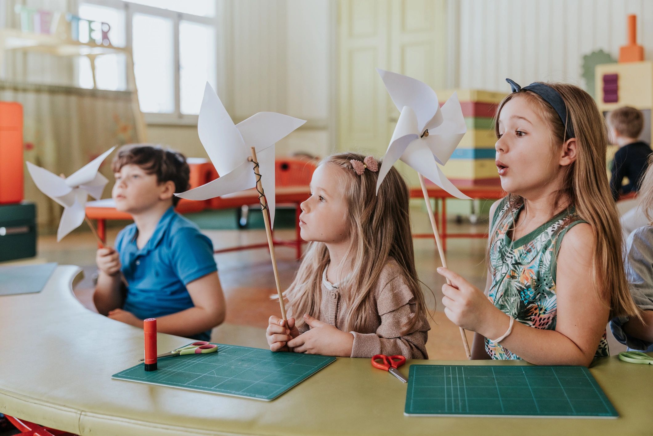 Children doing a classroom craft activity